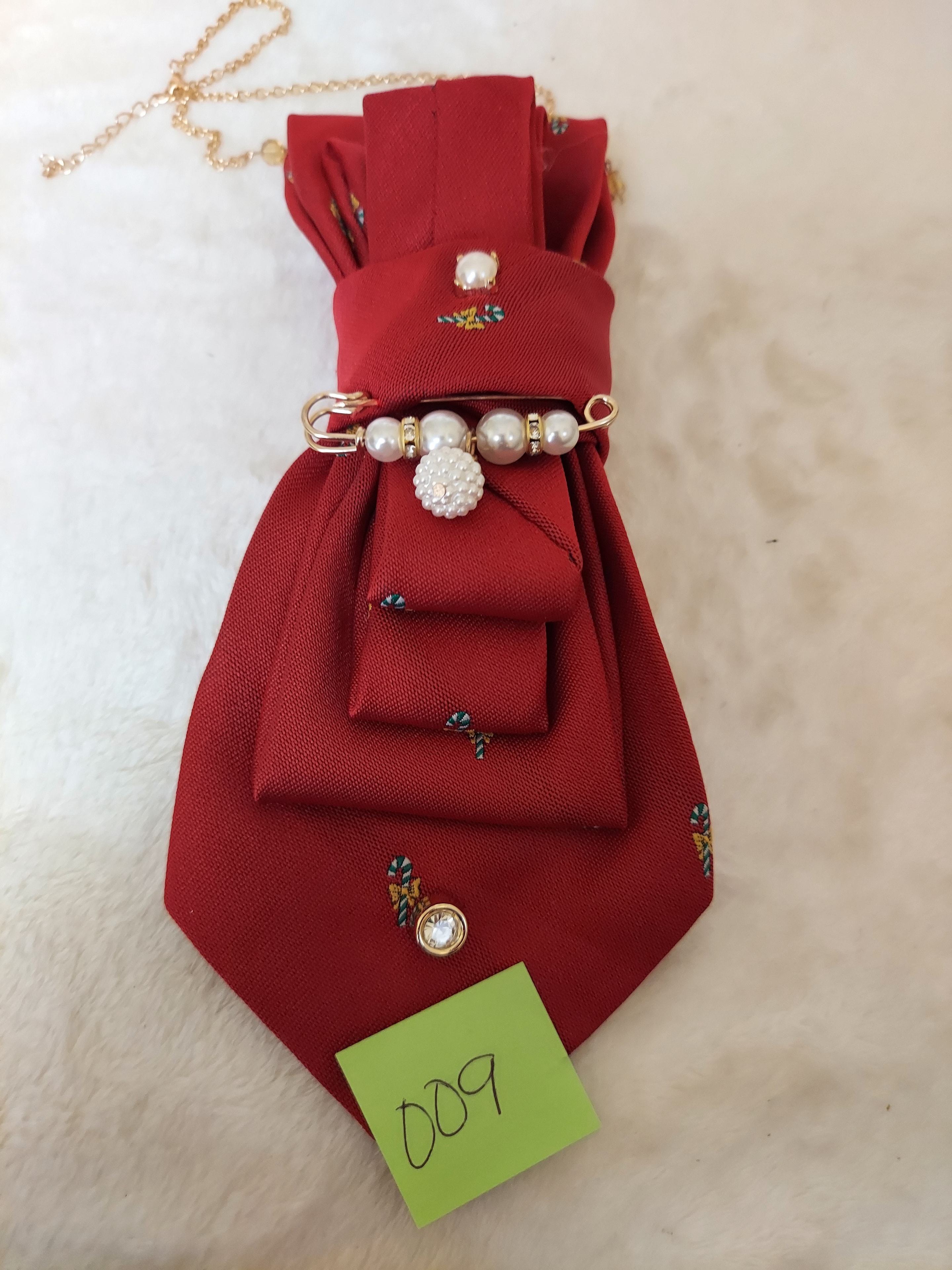 Red embroidered necktie clutch with pearl accents