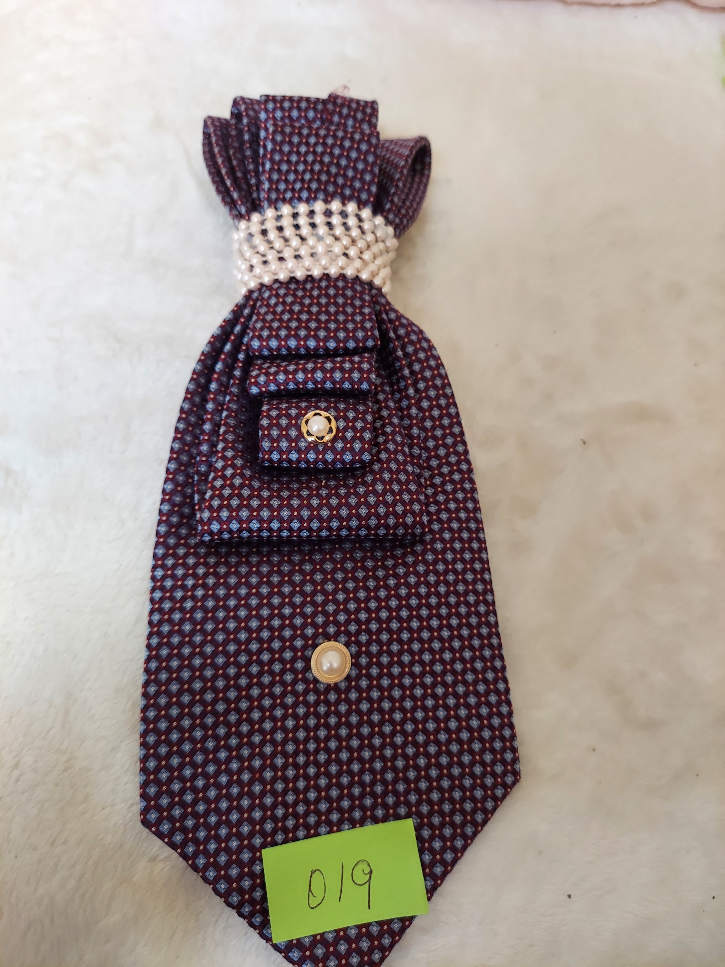 Burgundy fabric fish with cream trim collection piece
