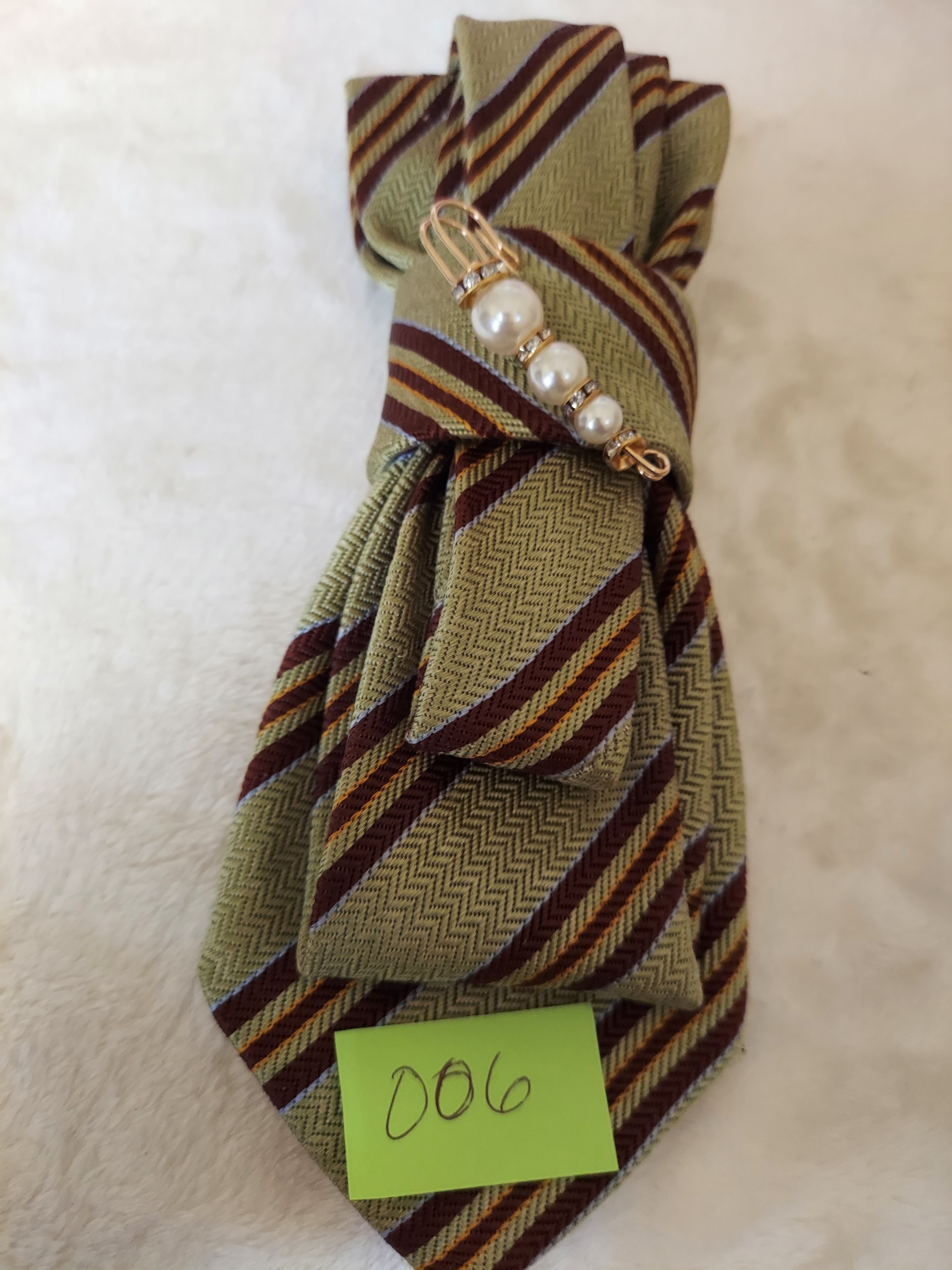 Necktie collection piece with embellishments